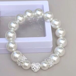 Lustrous Pearl Bracelet with Heart Accent